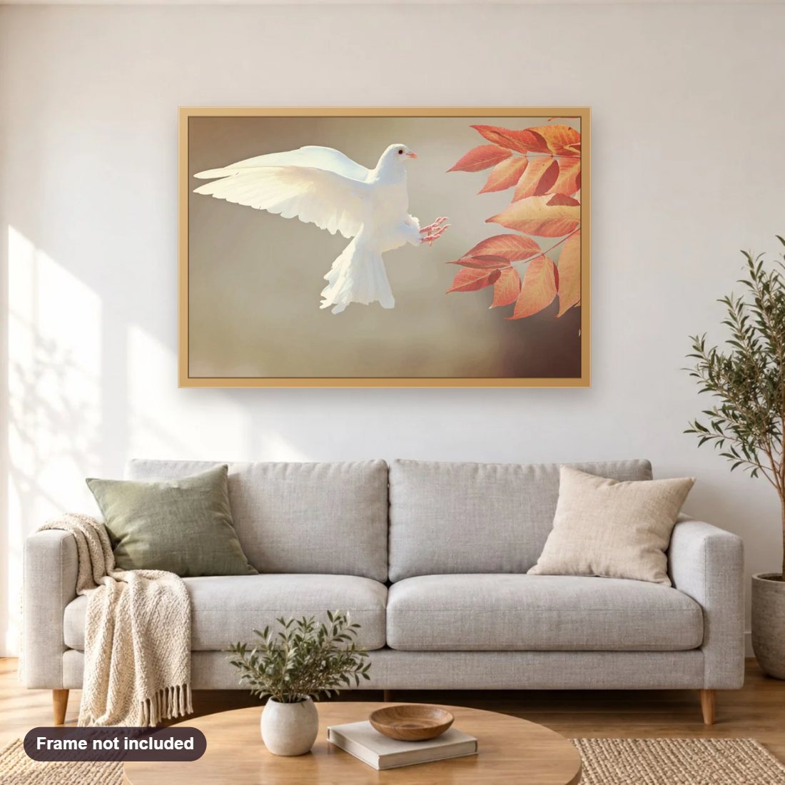White Pigeon & Autumn Leaves diamond painting shown framed on a living room wall above a sofa