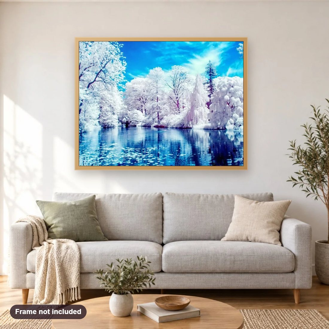White Trees by the Lake diamond painting shown framed on a living room wall above a sofa
