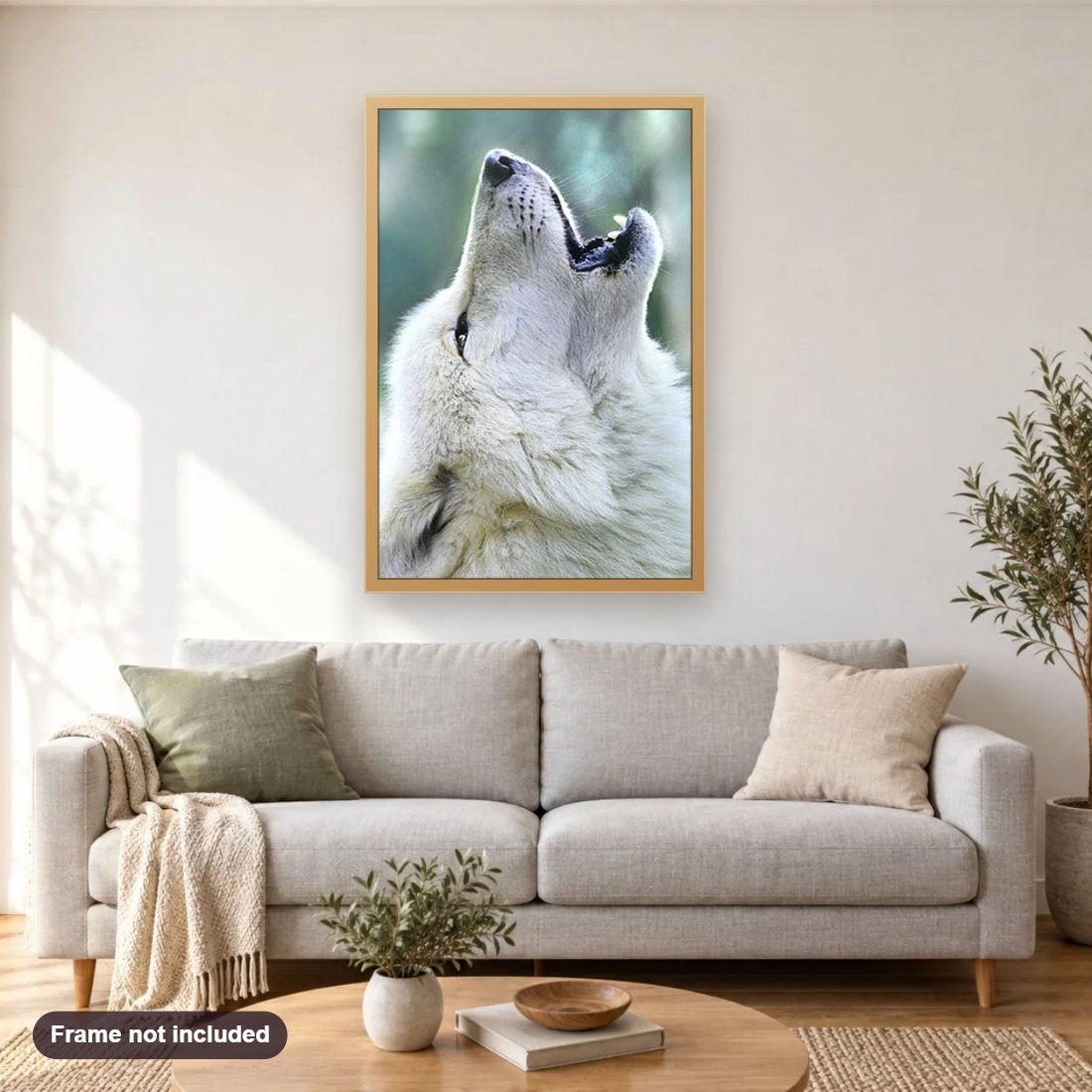 White Wolf Howling diamond painting shown framed on a living room wall above a sofa