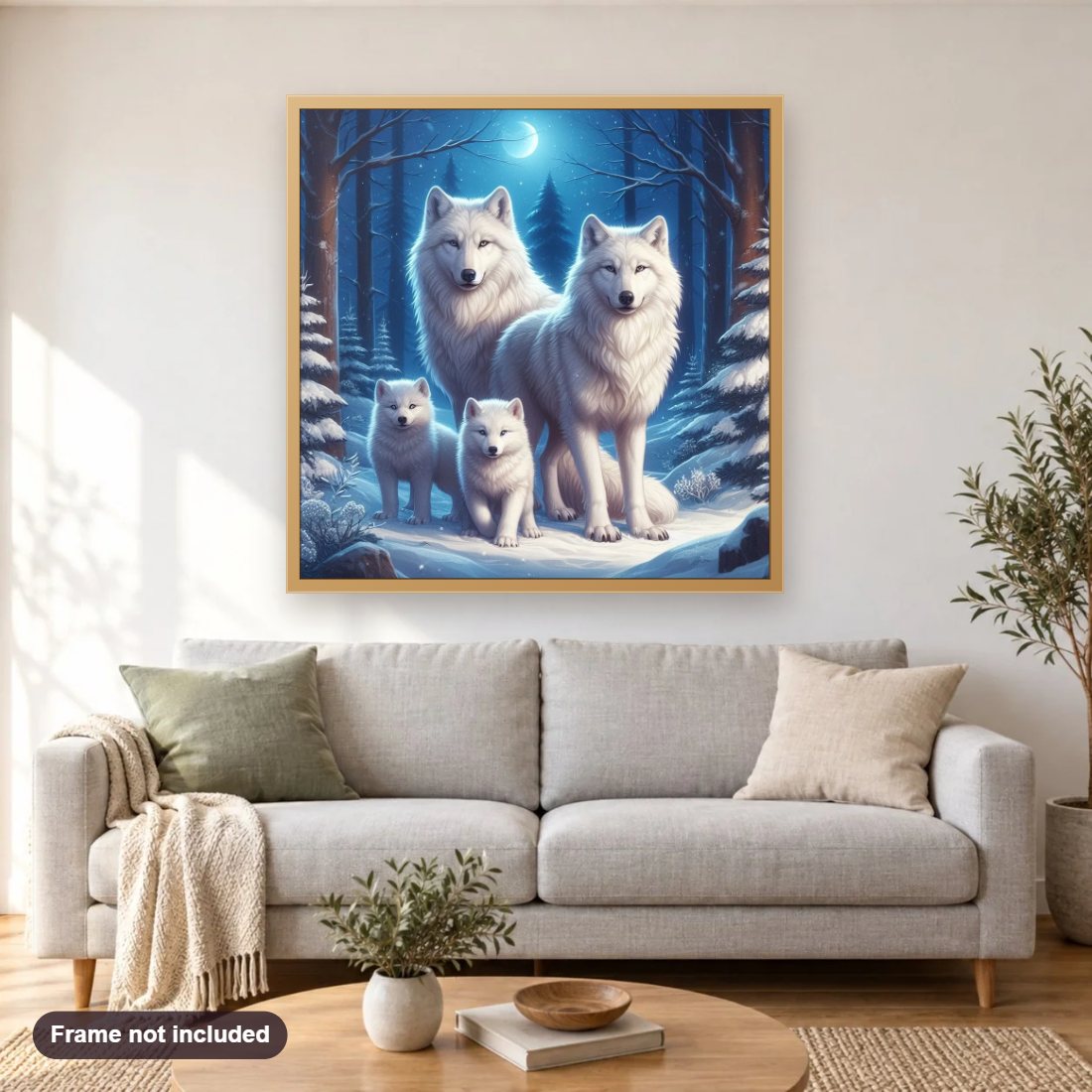 White Wovles with Cubs in Snowy Night diamond painting shown framed on a living room wall above a sofa