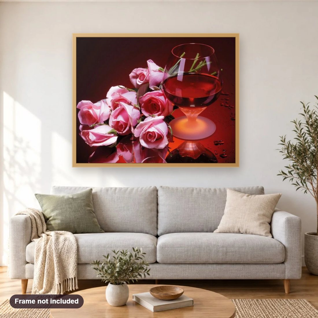 Wine & Roses diamond painting shown framed on a living room wall above a sofa