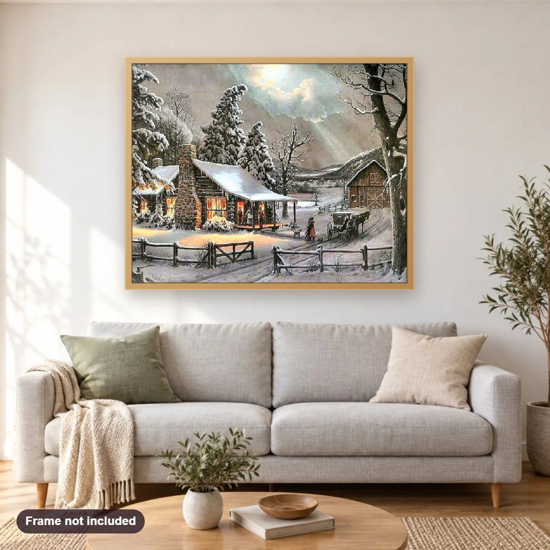 Winter Scene diamond painting shown framed on a living room wall above a sofa