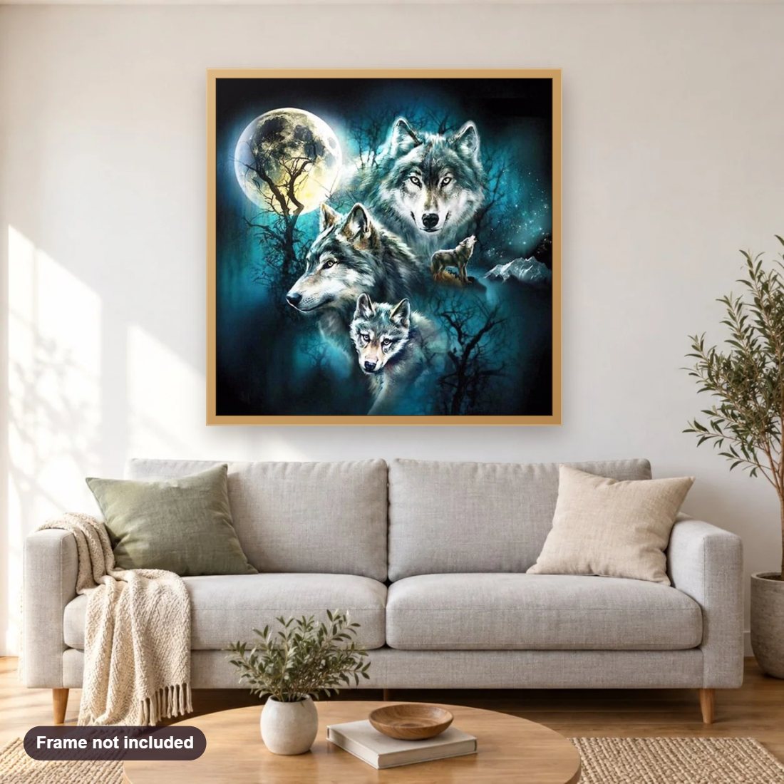 Wolves under Full Moon diamond painting shown framed on a living room wall above a sofa