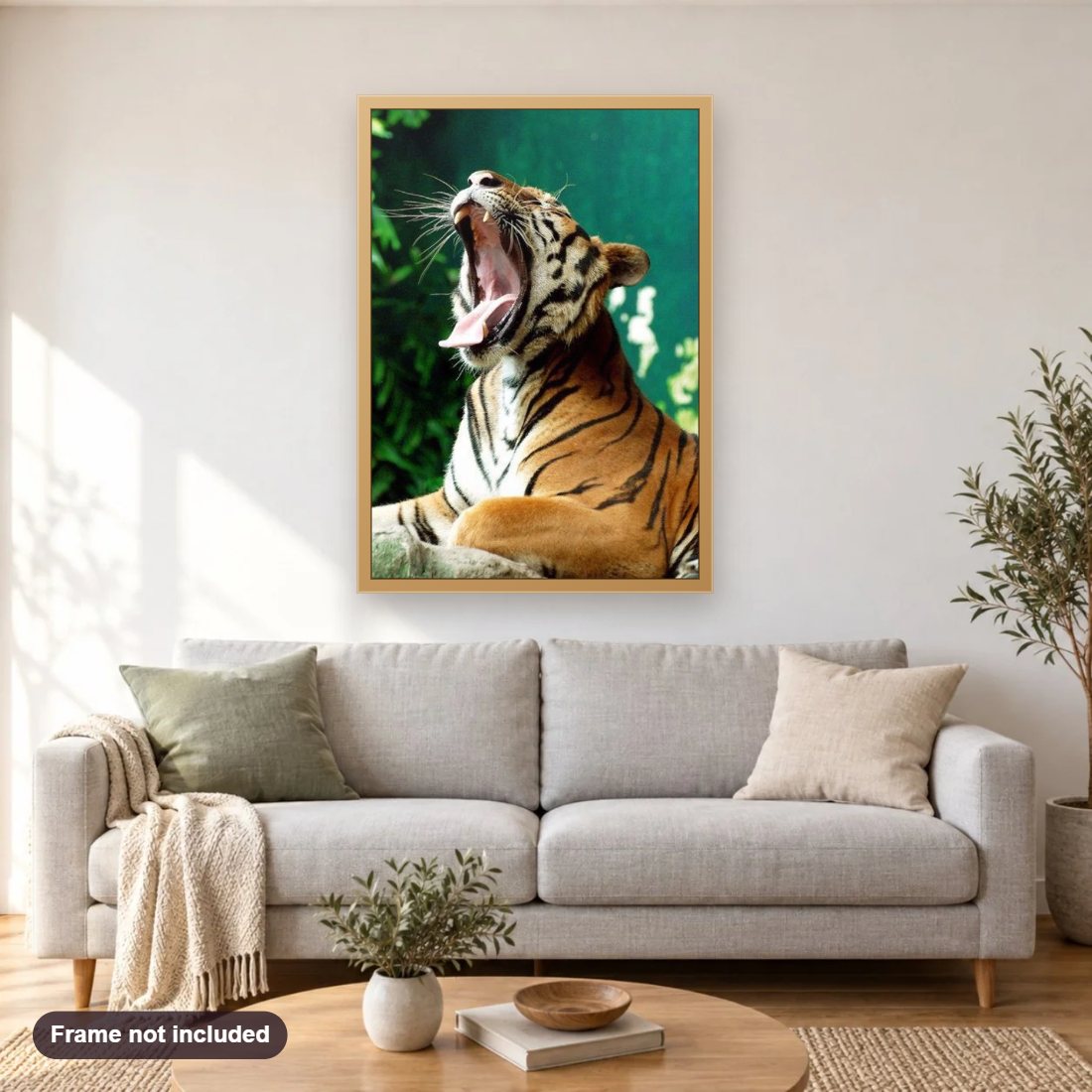 Yawning Tiger diamond painting shown framed on a living room wall above a sofa