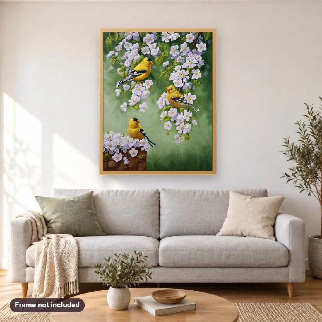 Yellow Birds & White Flowers diamond painting shown framed on a living room wall above a sofa