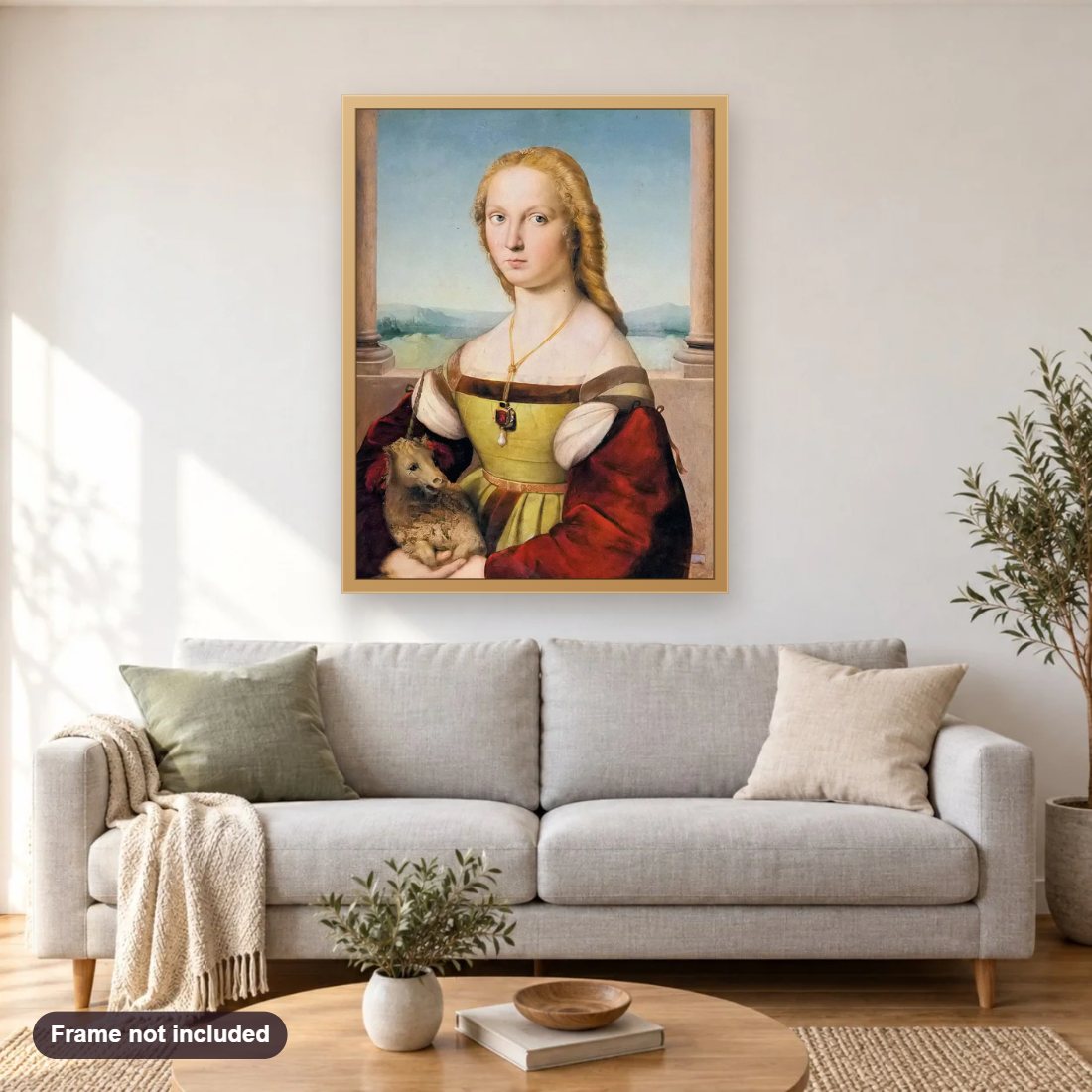Young Woman with Unicorn diamond painting shown framed on a living room wall above a sofa