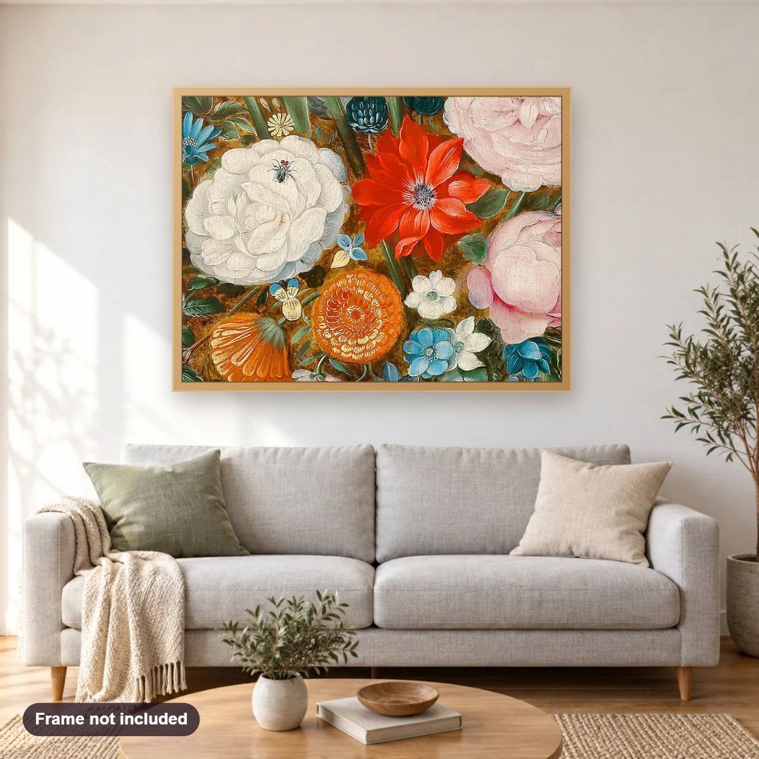 Zinnia Flowers diamond painting shown framed on a living room wall above a sofa